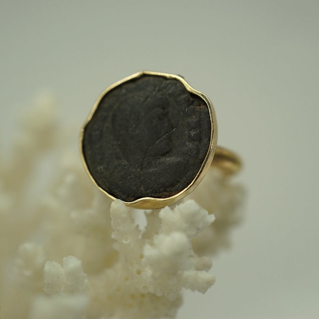 we love the crack that goes through the coin adding to the.