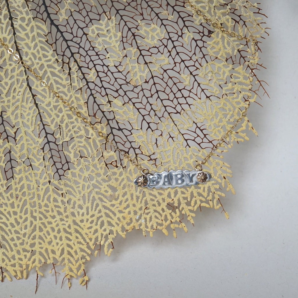 Silver and Gold Baby Necklace. Badgers Velvet