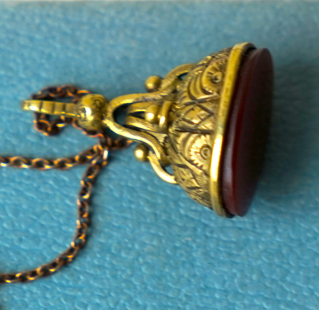 Gold coloured Antique pocket Watch fob and oxidised silver chain