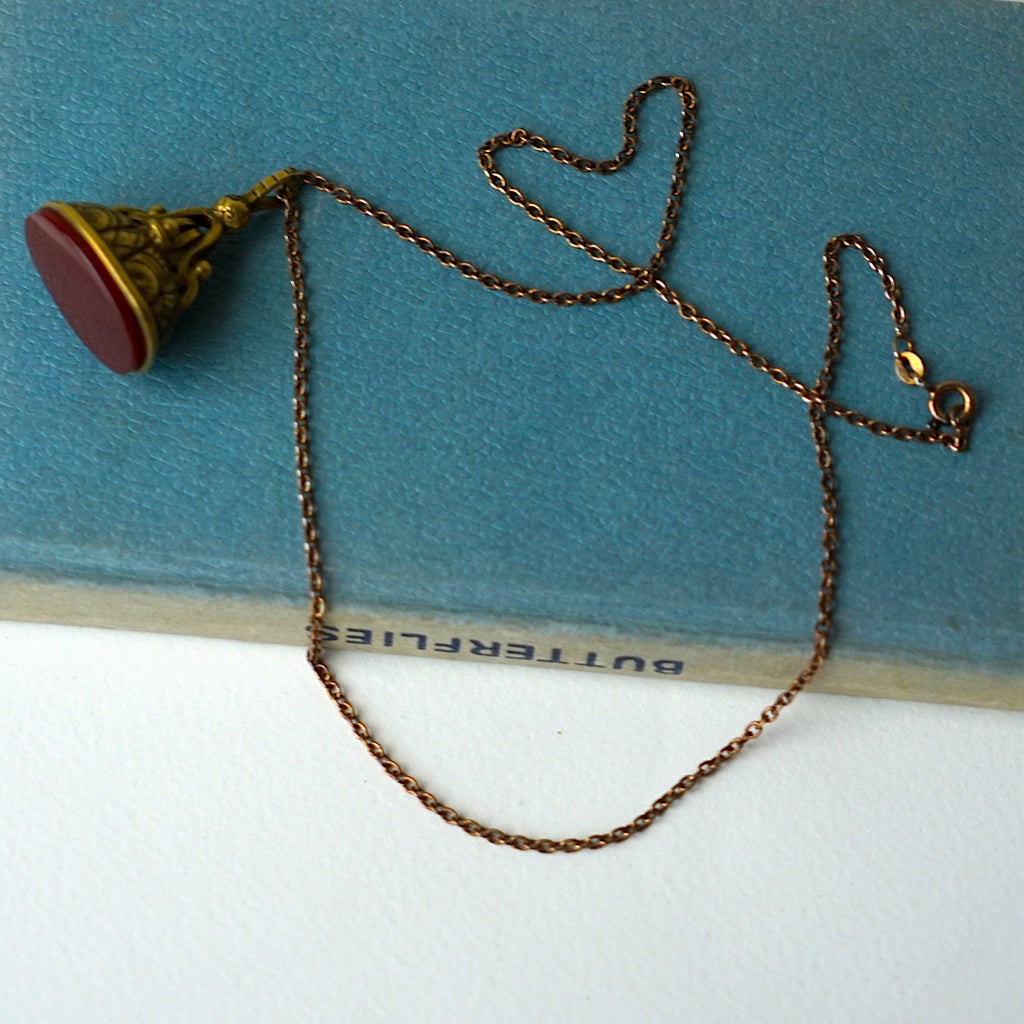 Gold coloured Antique pocket Watch fob and oxidised silver chain