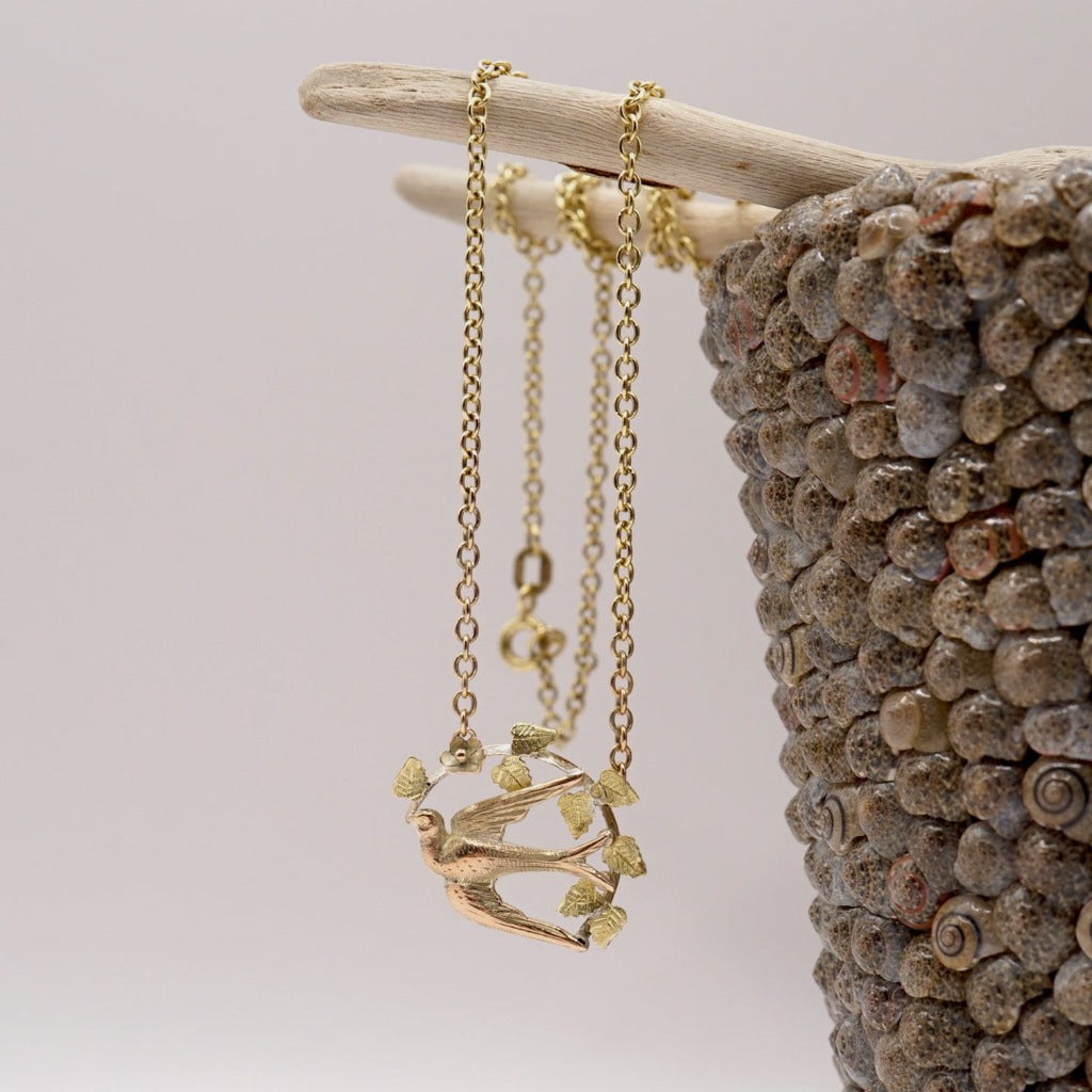 Gold Swallow and Bower Necklace