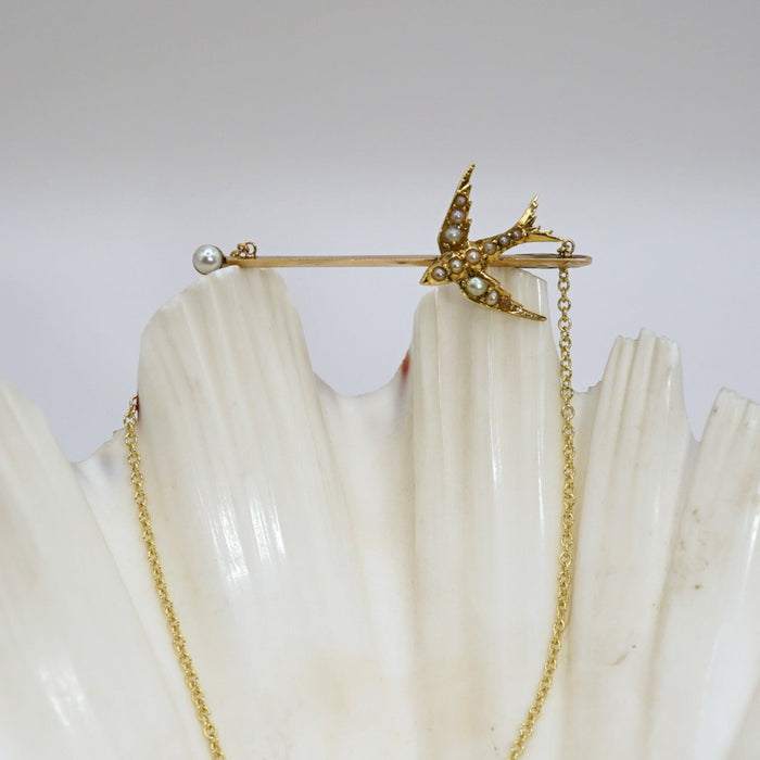 Gold and Seed Pearl Swallow Bar Necklace. Badger's velvet