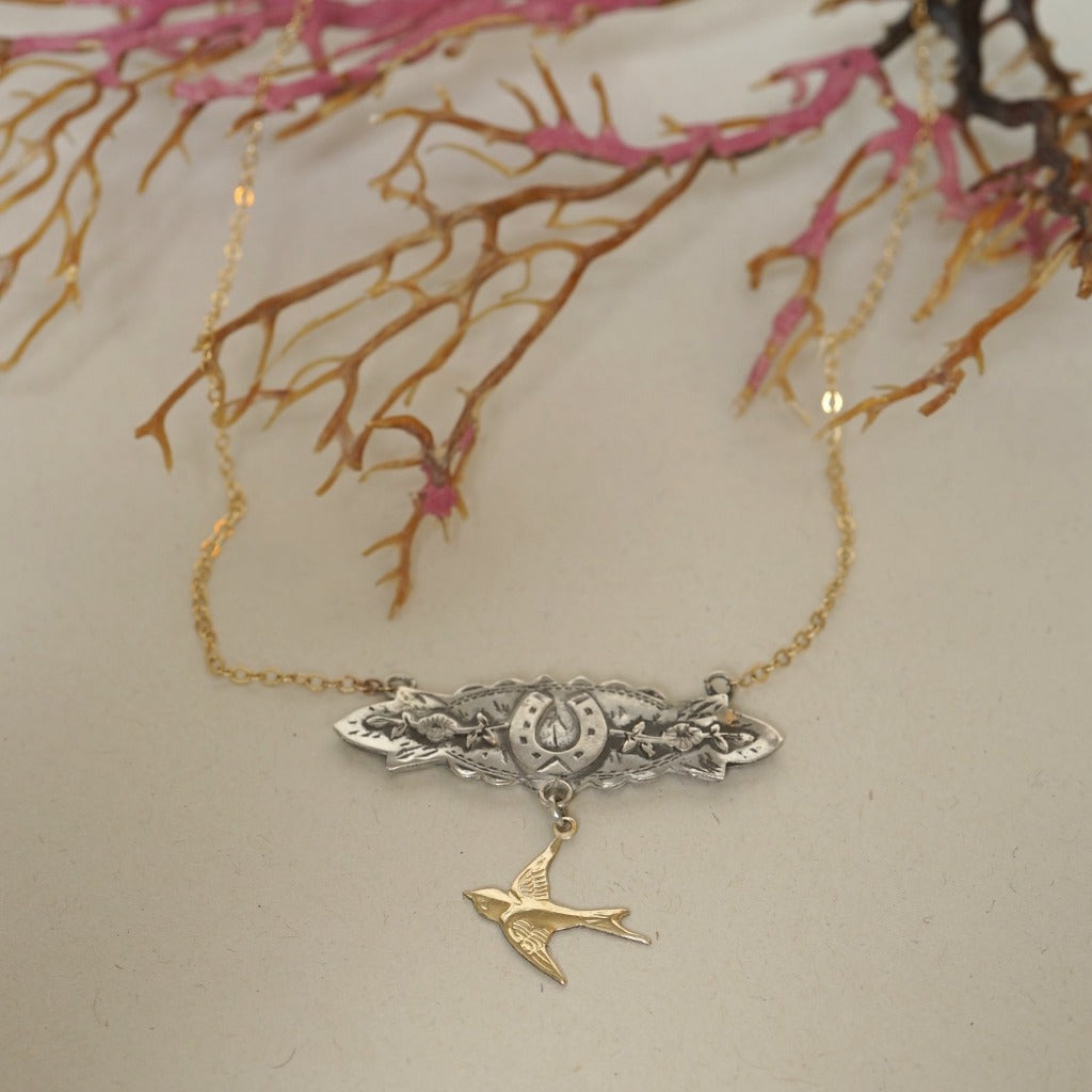 Silver and Gold Horseshoe and Swallow Necklace