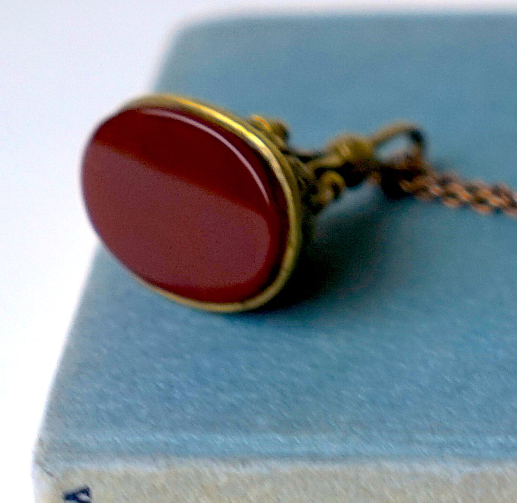 Gold coloured Antique pocket Watch fob and oxidised silver chain