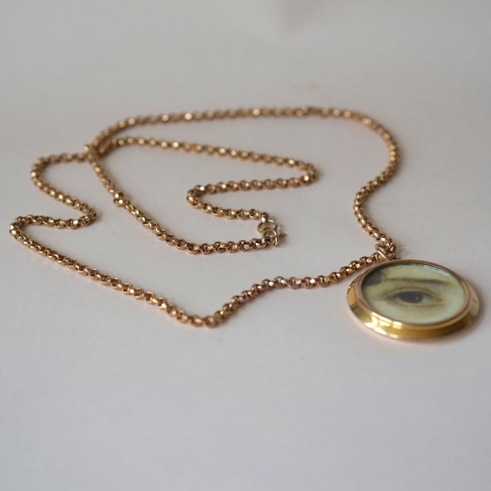 Gold Lover's Eye Locket and Long Guard Chain Necklace